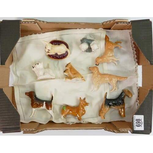 A collection of small Beswick dogs (9)