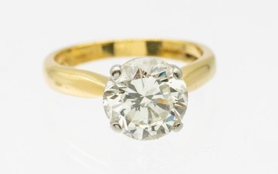 A diamond and 18ct gold solitaire ring, comprising a claw...