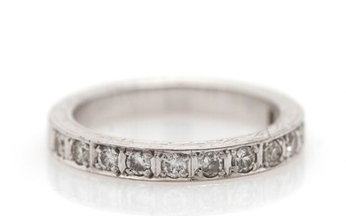 NOT SOLD. A diamond eternity ring set with numerous single and brilliant-cut diamonds, mounted in...