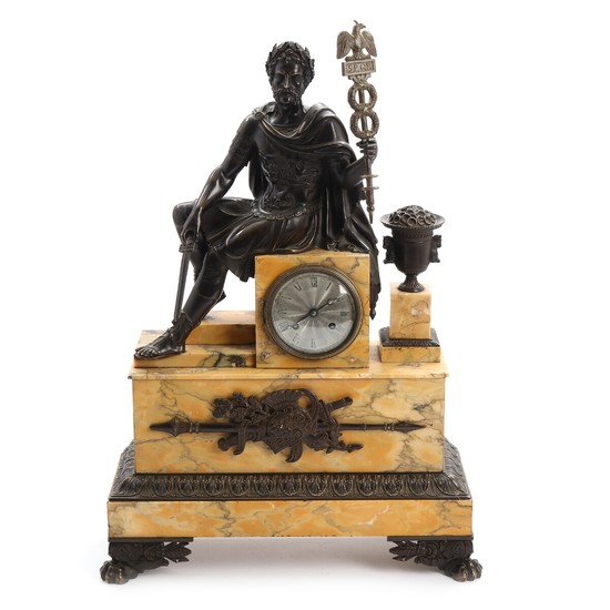 A first part of the 19th century Siena marble and patinated bronze mantel clock. H. 58 cm.