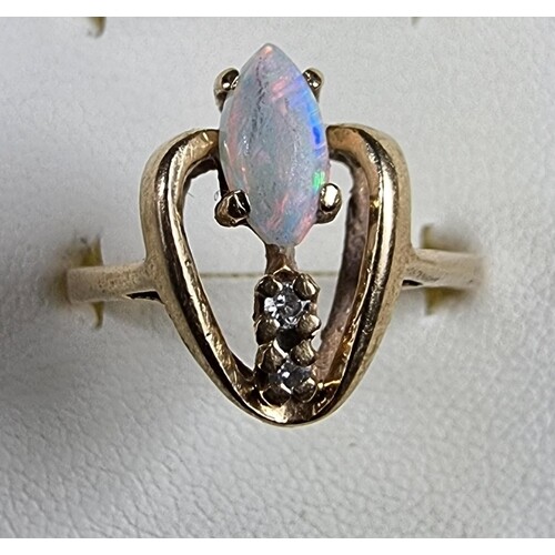 A gold, opal and diamond ring, size Q, 3.3 gm