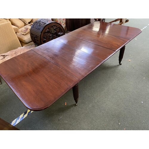 A good quality William IV mahogany rectangular dining table,...