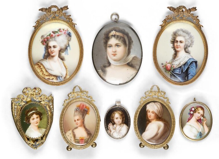 A group of eight Continental porcelain portrait plaques, late 19th/early 20th century, comprising: a pair in gilt-brass frames with quiver and torch mounts, 8.5 x 7cm; a pair with easel back frames and ribbon-tied wreath mounts to the frames, 6 x...