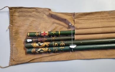 A group of four unusual warden's long wooden wands...