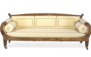 A large Regency rosewood and brass mounted sofa. England, early 19th century. L. 245 cm.