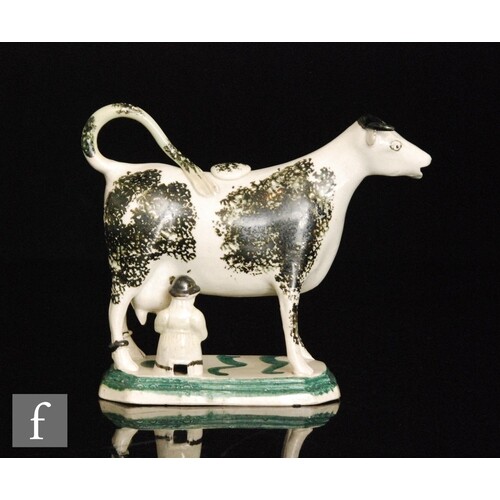 A late 18th to early 19th Century Staffordshire cow creamer ...