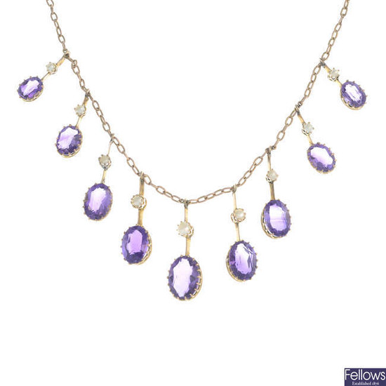 A late 19th century gold amethyst and seed pearl necklace.