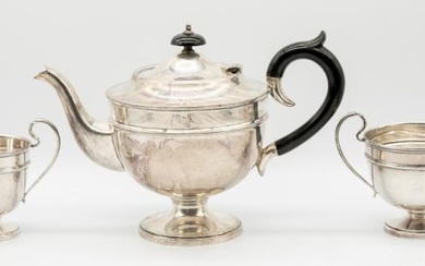 A matched George V silver three piece tea set consisting...