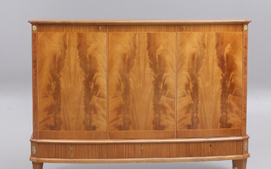 A mid-20th century Gustavian style mahogany linen cupboard.