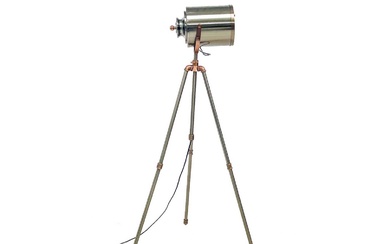 A nautical or studio style standard lamp.