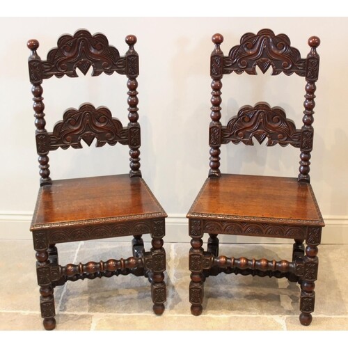 A pair of 17th century style oak Derbyshire side chairs, 20t...