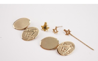 A pair of 9ct gold freemason cufflinks, along with a 9ct gol...