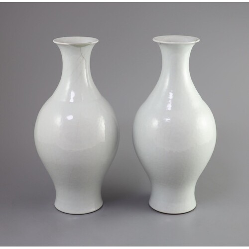 A pair of Chinese Guan-type vases, ganlan, Qianlong seal mar...