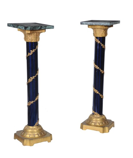 A pair of Empire style marble gilt metal and blue lacquered pedestals