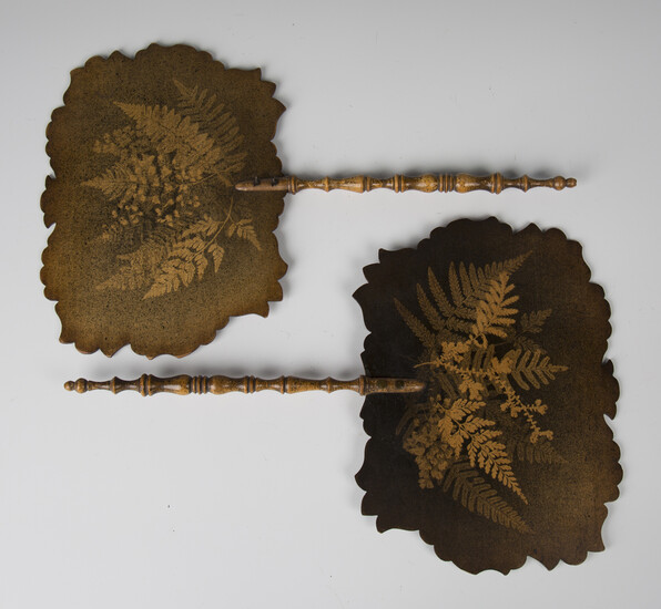 A pair of Victorian fernware face screens, each fitted with a turned handle, length 38cm, width 24cm