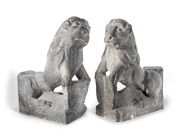 A pair of carved stone Stylobate Lions