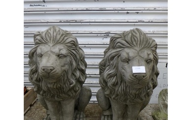 A pair of stone effect concrete lion garden ornaments - appr...