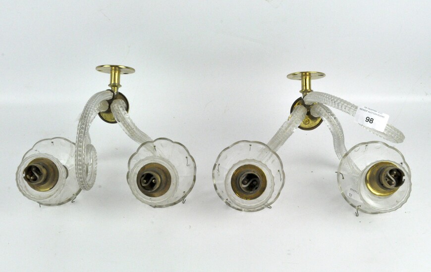 A pair of vintage twin armed glass wall sconces
