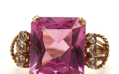 SOLD. A pink sapphire ring set with synthetic pink sapphire and spinel, mounted in 18k gold. Size 57. Weight app. 7 g. – Bruun Rasmussen Auctioneers of Fine Art