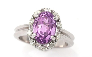 NOT SOLD. A ring set with an oval-cut kunzite weighing app. 4.08 ct. encircled by numerous diamonds, mounted in 14k white gold. Size 52. – Bruun Rasmussen Auctioneers of Fine Art