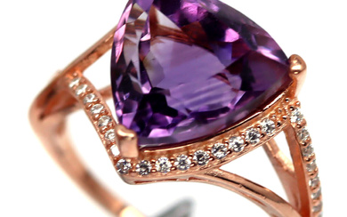 A rose gold on 925 silver ring set with a trillion cut amethyst and white stones, ring size N.5.