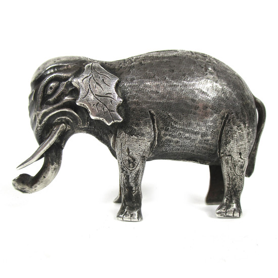 A silver model of an elephant