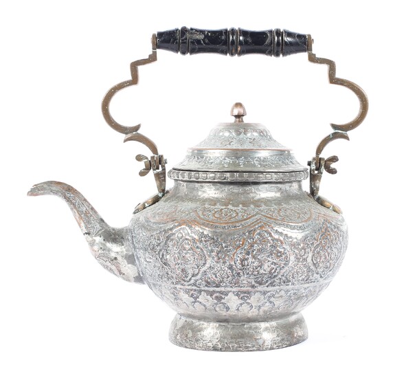A white metal Persian teapot and cover, probably Iranian, late 19th/early 20th century