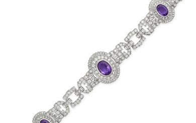 AN AMETHYST AND DIAMOND BRACELET, 1940s in platinum, set with three oval cut amethysts in double ...