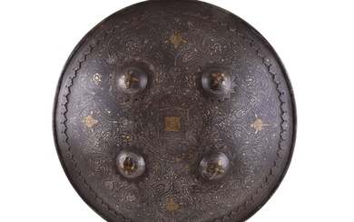 AN ELABORATE INDIAN SHIELD WITH GOLD AND SILVER DAMASCENE, CA....