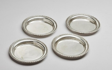 ARGENTIERE ITALIANO DEL XX SECOLO Four silver saucers.
