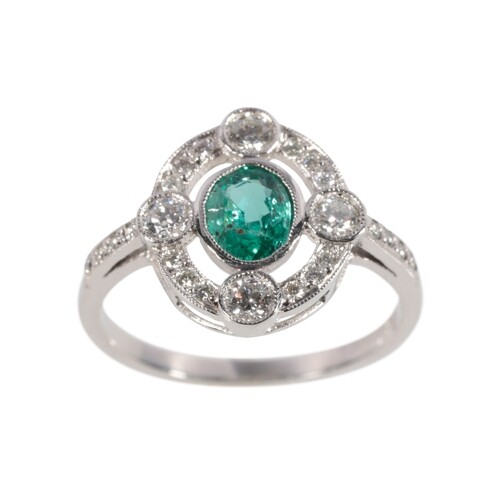 ART DECO EMERALD AND DIAMOND RING the oval-cut emerald c.0.4...
