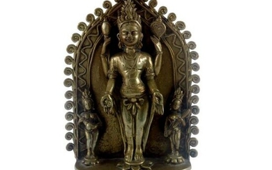 An Indian cast brass figure of a four ar