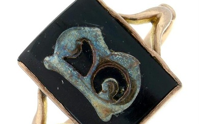 An onyx initial 'B' signet ring.