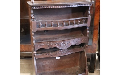 Antique French oak wall rack, well carved shaped front apron...