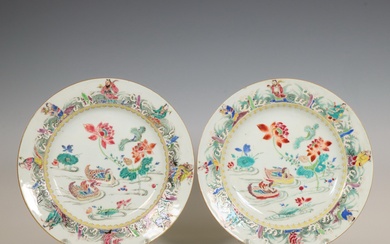 China, a pair of famille rose 'Mandarin ducks and Daoist Immortals' plates, ca. 1740