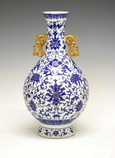 Chinese porcelain vase, of bulbous form with gilt handles...