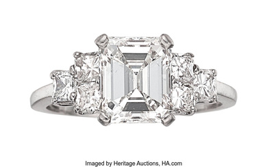 Diamond, Platinum Ring Stones: Emerald-cut diamond weighing 2.50 carats;...