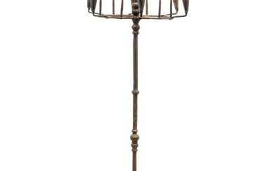 FLOOR-STANDING FORGED IRON PRICKET AND SOCKET CANDLESTAND.