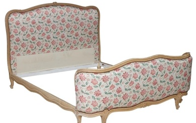 French Louis XV Style Creme Peinte Bed, 20th c., the floral carved arched crest, with shaped rails