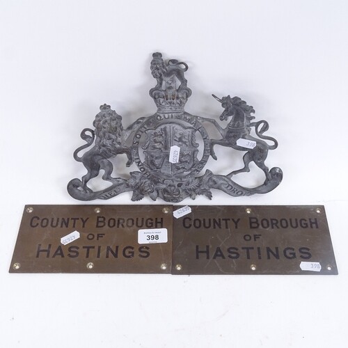 A cast-brass Royal coat of arms, length 29cm, and 2 brass Co...