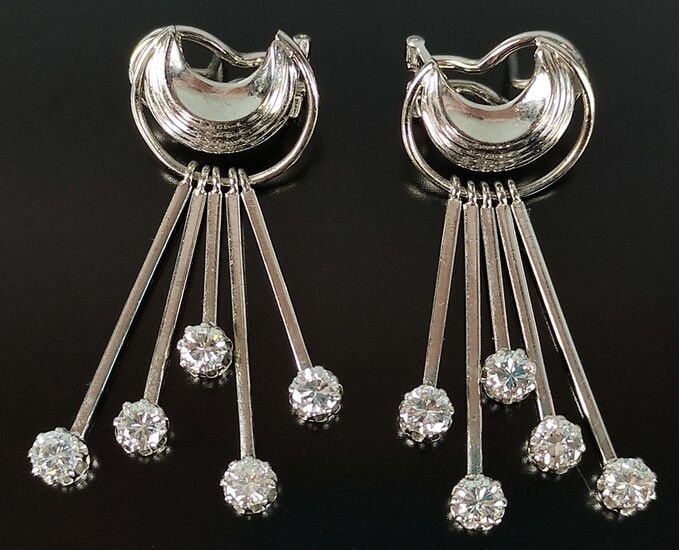 Pair of diamond earrings, crescent shaped element, on each 5 movable bars with diamond ends, 750/18