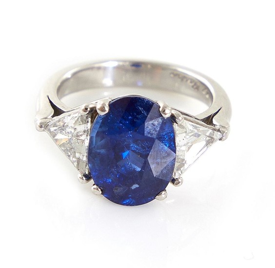 Platinum, blue sapphire and diamond ring