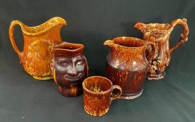 Pottery lot, including 4 pitchers and mug