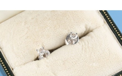 Property of a lady - a pair of 18ct white gold diamond stud ...