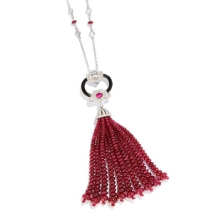 RUBY, DIAMOND AND ONYX TASSEL PENDANT in white gold or
