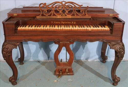 Rosewood Empire pump organ, heavily carved