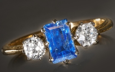SAPPHIRE AND DIAMOND THREE STONE RING . Vibrant blue sapphi...