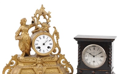 Two mantle clocks comprising a French gilt metal figural exa...