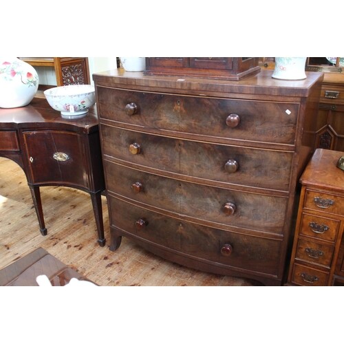 Victorian mahogany bow front chest of four long drawers on s...