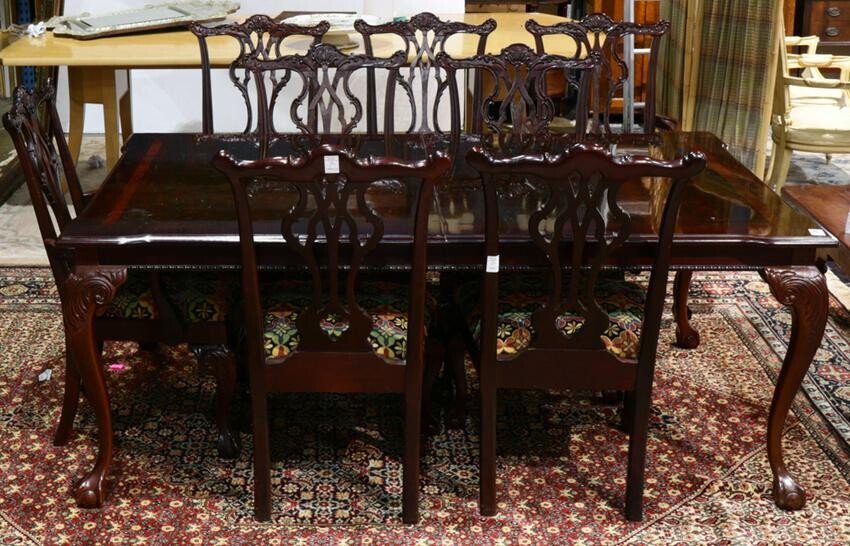 A Chippendale style dining suite